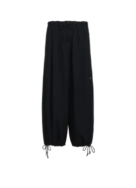 WASHER FINISHED WOOL GABARDINE BALLOON PANTS WITH ZIPPER POCKETS